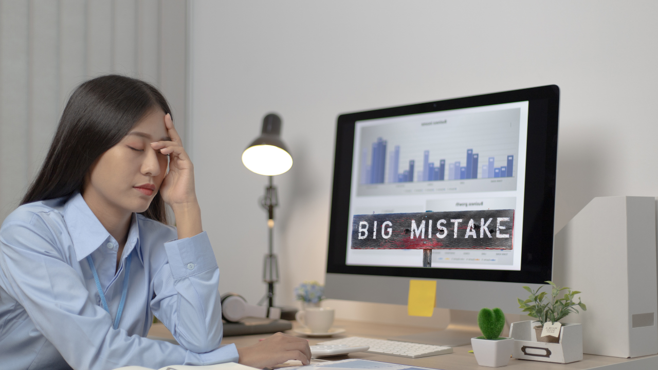A woman upset after making a mistake at work.
