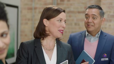 Two colleagues in conversation